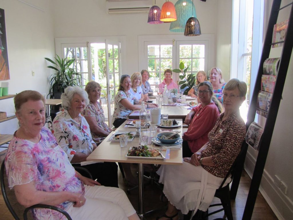 Guests around a cafe table