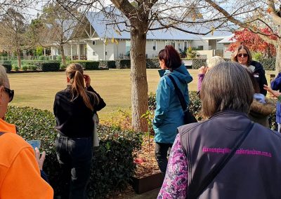 EWHA members and non-members walking around a private garden in Balnarring.