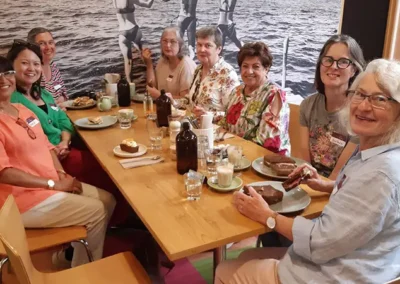 A group of women at a cafe enjoying lunch